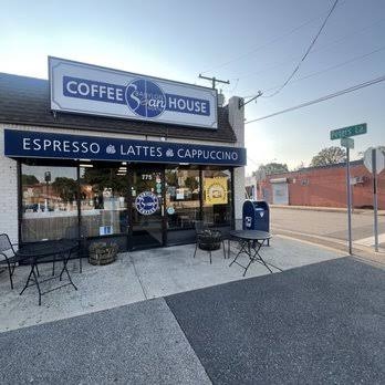 Babylon Bean North on the corner of Deer Park Ave, with tables out front